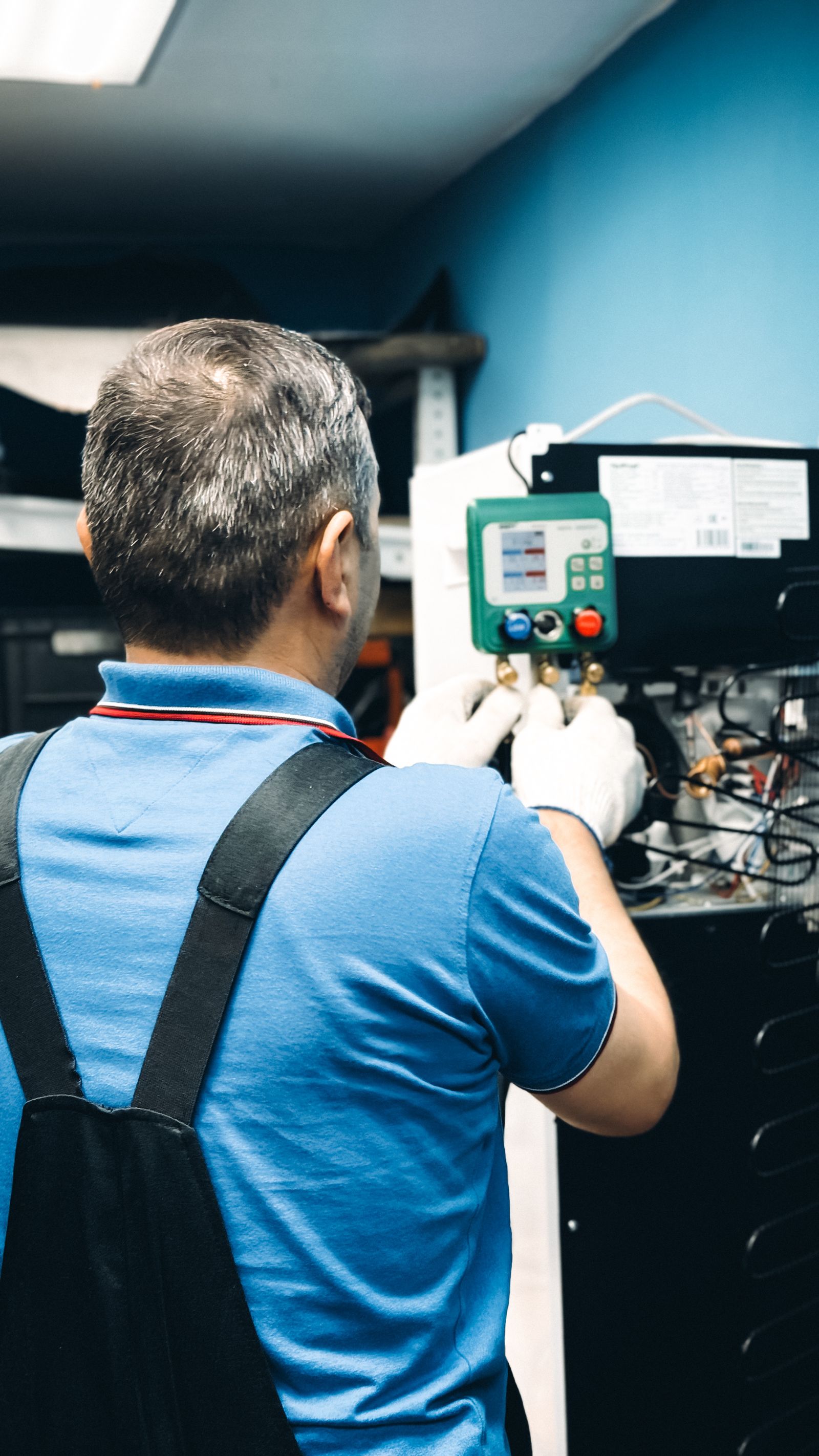 HVAC repair technician at work
